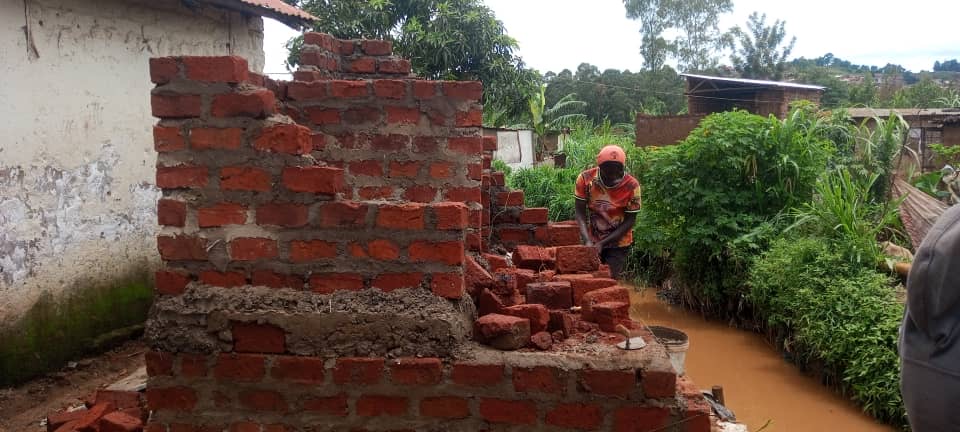 Workers Building Toilet Facilities